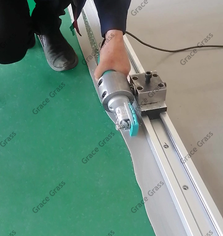 Our custom track system with a mounted electric rotary shear