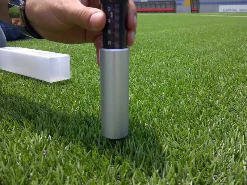 inspection of commercial synthetic turf field infill 